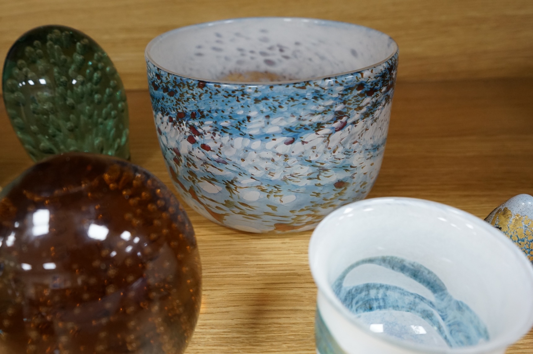A collection of mixed art glass and paperweights, including two Mdina flared rimmed glass vases, Adrian Shankey glass, an Isle of Wight squat vase, various paperweights and a dump etc. (15)